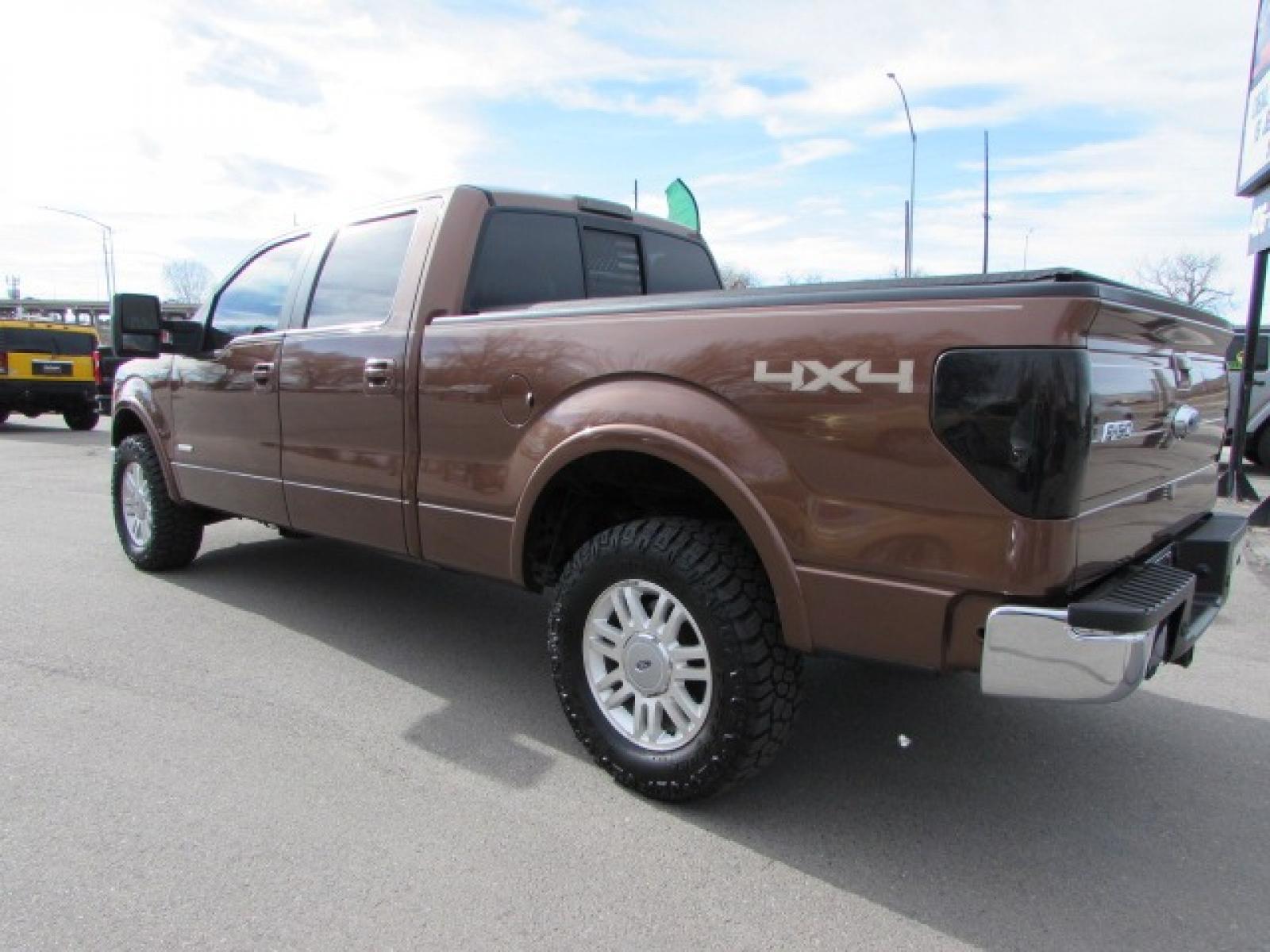 2011 Bronze /Black Ford F-150 Lariat SuperCrew (1FTFW1ETXBF) with an 3.5 Ecocoost Twin Turbo V6 engine, 6 speed automatic transmission, located at 4562 State Avenue, Billings, MT, 59101, (406) 896-9833, 45.769516, -108.526772 - 2011 Ford F-150 Lariat SuperCrew 6.5-ft. Bed 4WD - Montana truck! 3.5L V6 Ecoboost Twin Turbo Engine - 6 speed automatic transmission - 4WD - 143,027 miles - Longbox Lariat Edition - climate control - tilt steering wheel - cruise control - bluetooth audio - Microsoft SYNC to pair your devices and - Photo #1